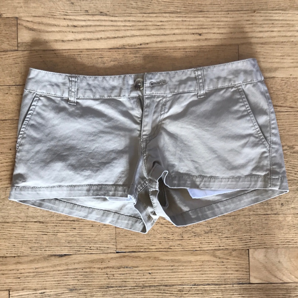 Tan shorts.